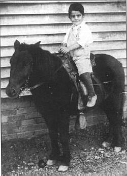 Al at age 5 — proud to be a cowboy!